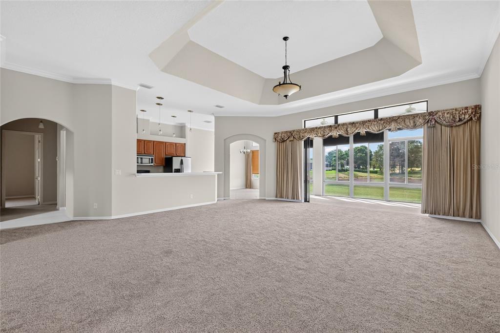 Living room with views of pond