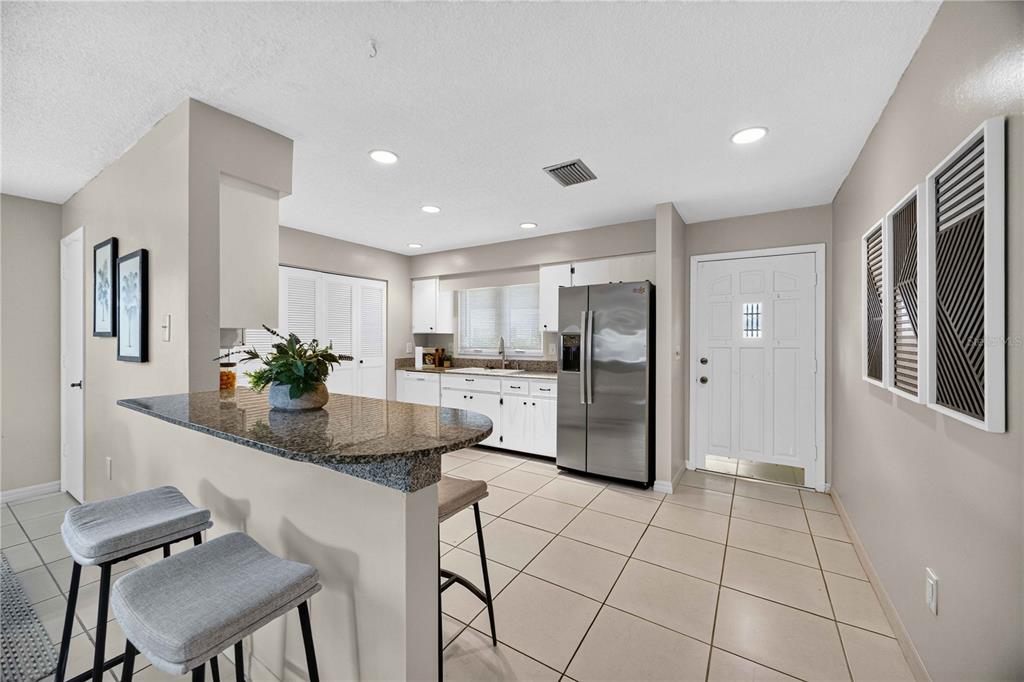 Large kitchen with breakfast bar