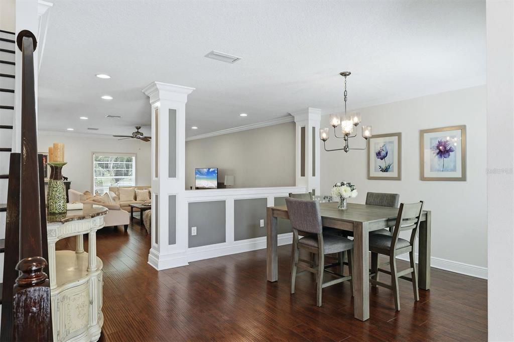 Dining Area with half wall to great room