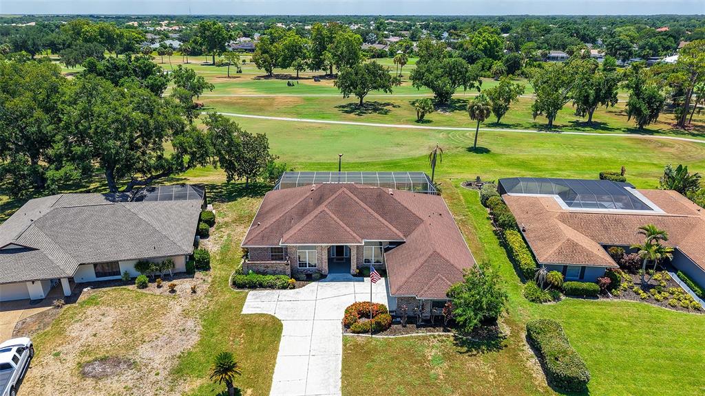 Privacy on a quiet street. Side entry 2.5 garage w/ add'l golf cart entry door