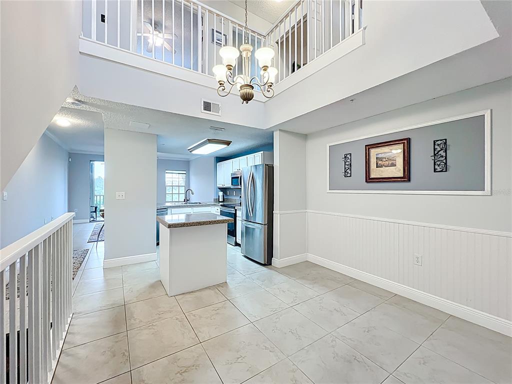 Main living areas are on 2nd floor with the kitchen as the central hub.