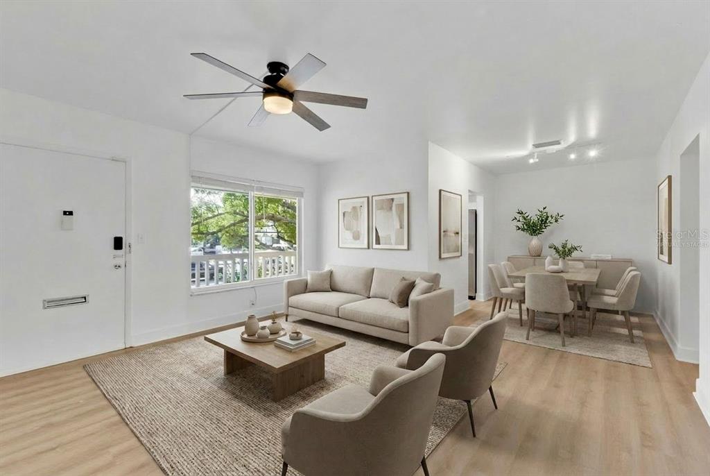 Living Room and Dining Area *This picture has been virtually staged