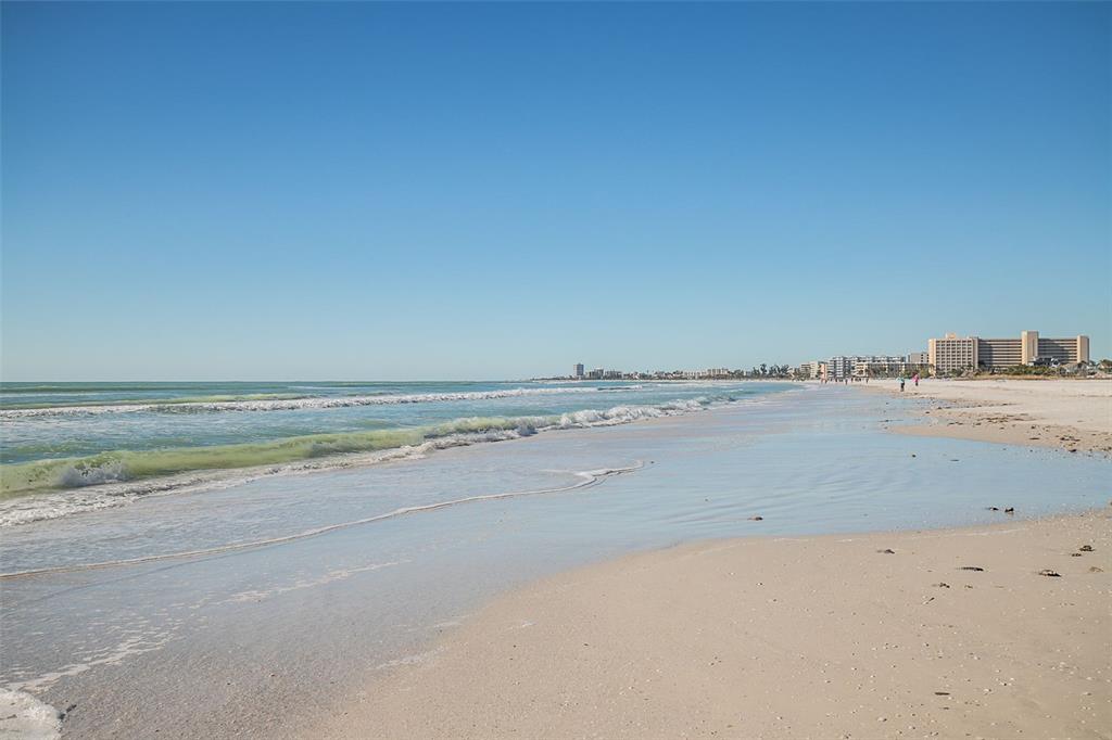 Enjoy your days sitting on the white sandy beach of Siesta Key steps from this updated villa.