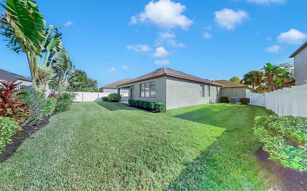 Right side/rear of home & backyard