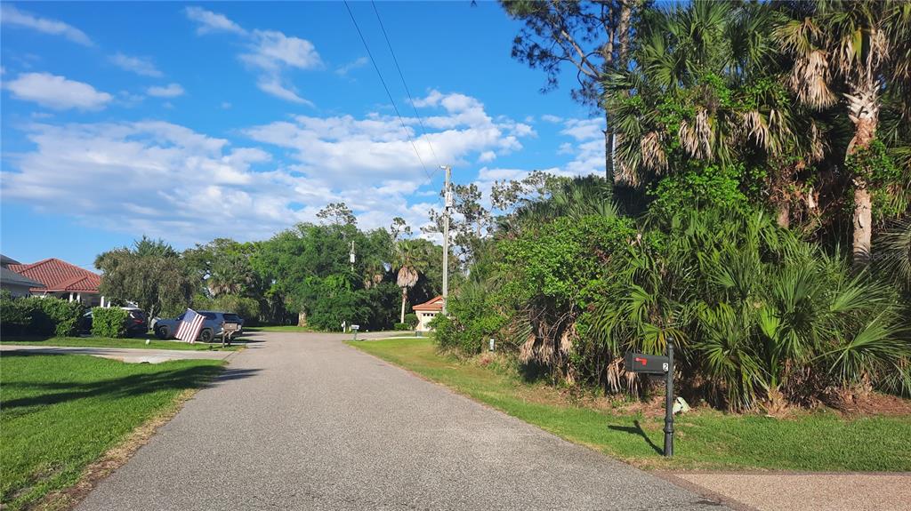 Cul-de-sac street/vacant lot on the right side