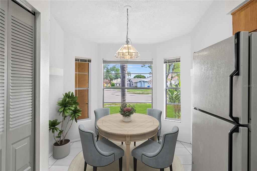 Kitchen staged with neutral colors and modern furniture