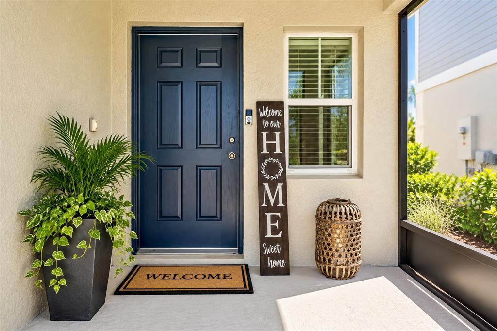Screened in front porch digitally staged.
