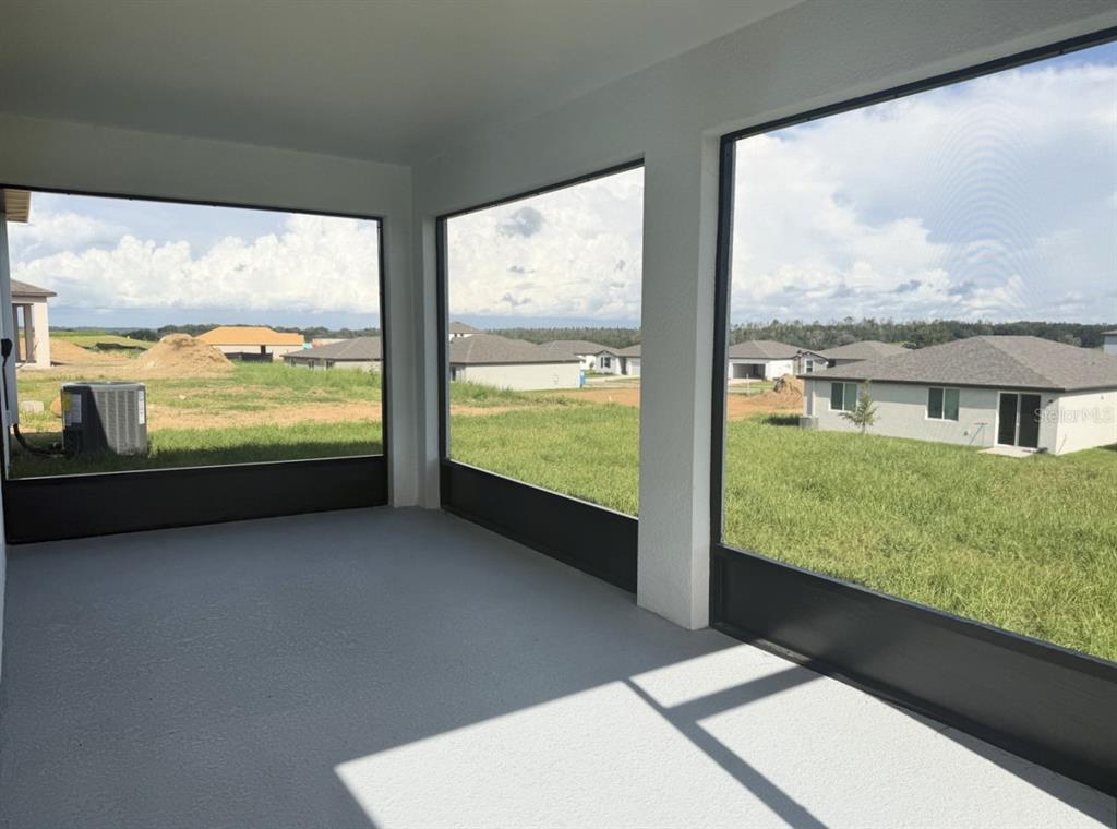 Fully covered and screened in lanai, perfect place to enjoy the breeze from the hill