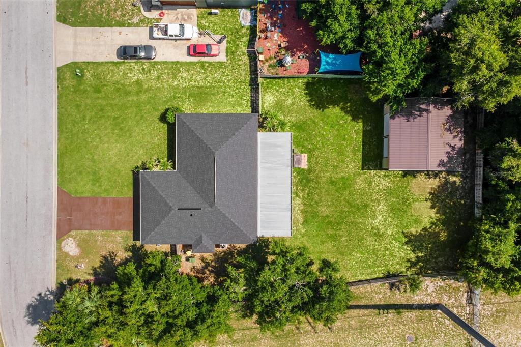 Exterior front of home. Located on just under 1/2 acre, fully fenced backyard, and large detached 2 car garage