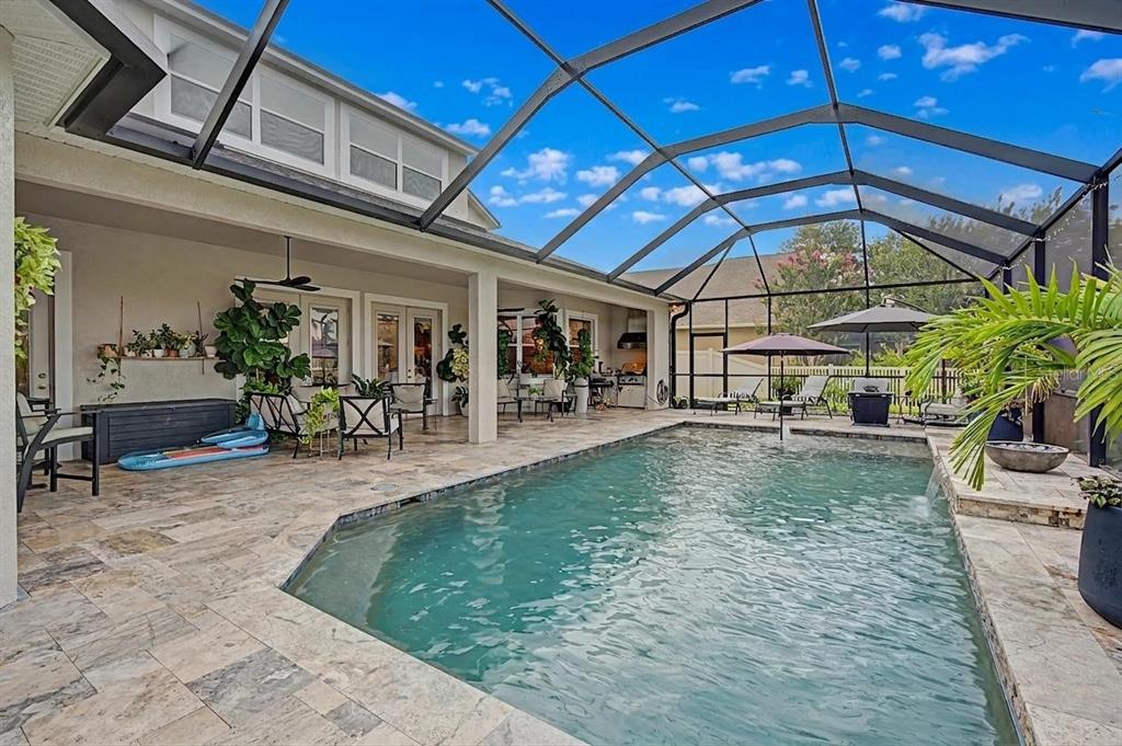 $100K pool package with Travertine deck