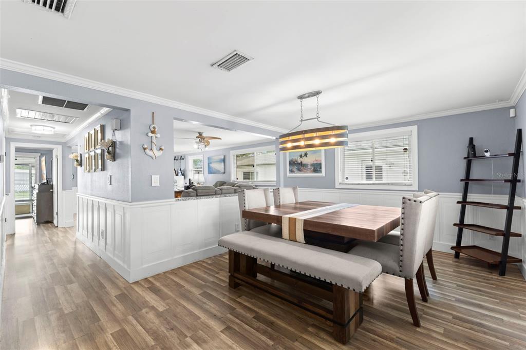 The home’s open layout, allows the dining area to flow easily into the adjoining living spaces while retaining its own distinct character.
