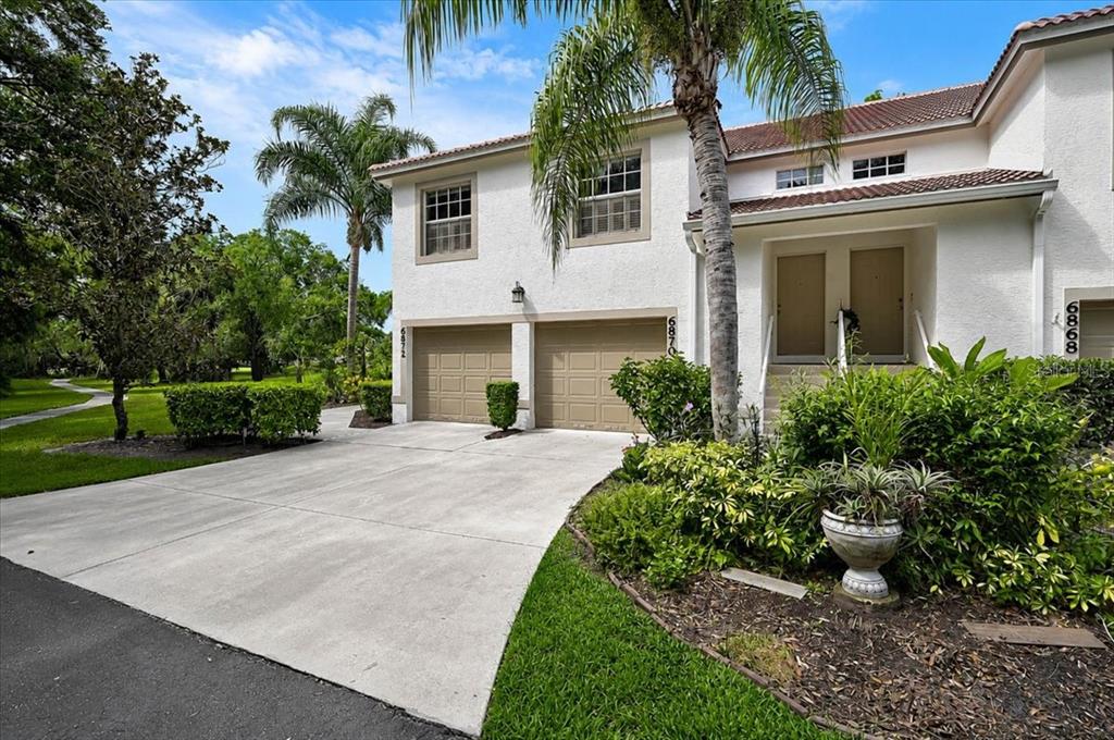 The one car garage has additional storage space and an indoor stairwell to the living area
