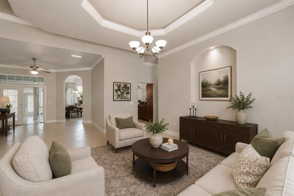 Large living room off foyer, virtually staged