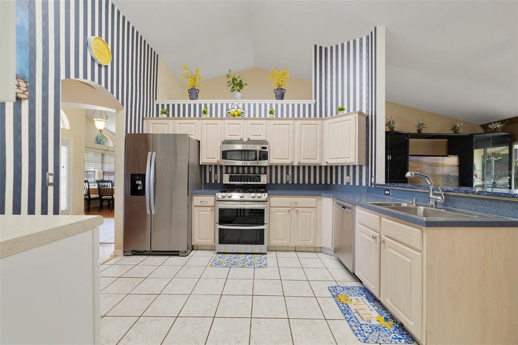 Complete with STAINLESS STEEL APPLIANCES, a breakfast bar, and an open view into the family room, the kitchen is designed to keep everyone connected.