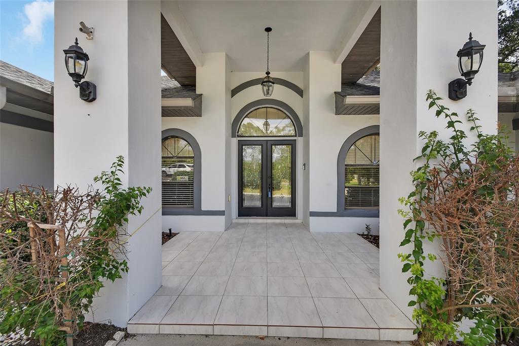Stately Covered Front Entry.