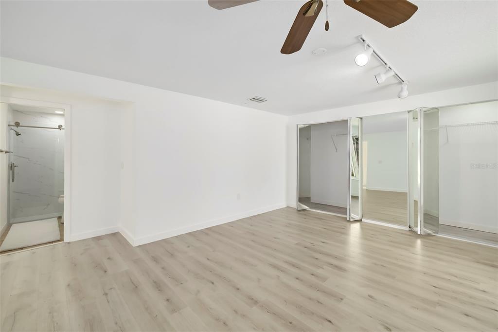 Primary with a remodeled full bathroom