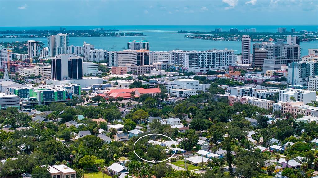 Aerial view showcases the home’s exceptional location just minutes from Downtown Sarasota, the waterfront, and the city’s vibrant cultural and dining scene.