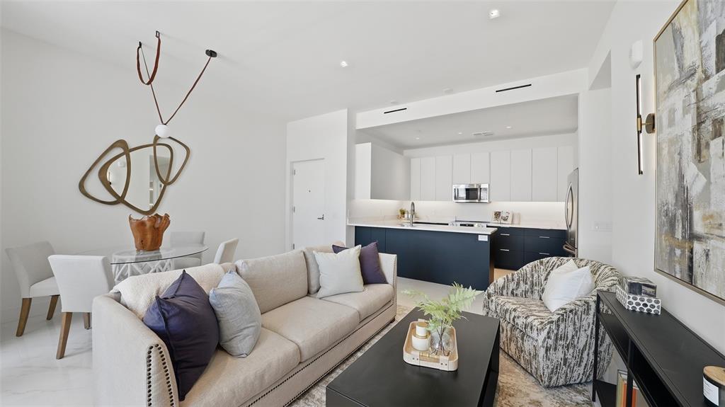 This contemporary condo features energy efficient construction, plenty of light PLUS an outside luxurious pool/spa courtyard.