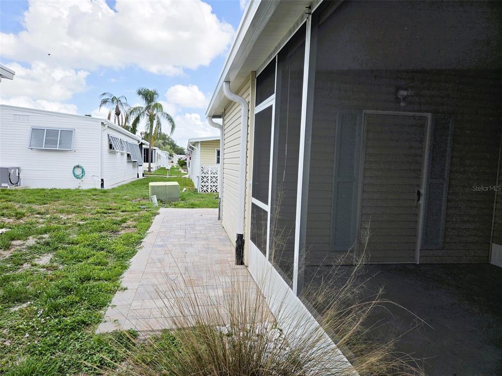 Left side view with paver walkway