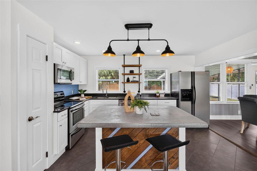 Kitchen has unique artistic touches throughout
