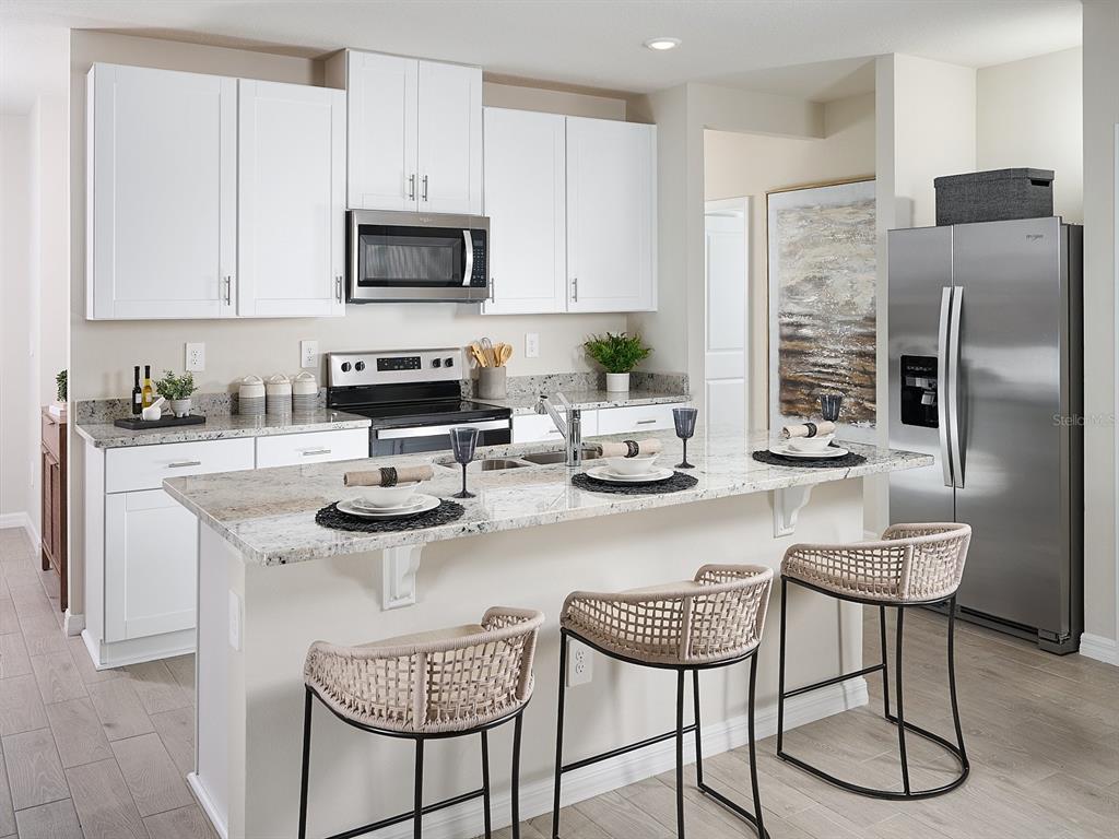 Discover the perfect blend of comfort and functionality in Springs at Lake Alfred. This thoughtfully designed floorplan features four spacious bedrooms and two full baths, offering plenty of room for families, guests, or a home office. The open-concept kitchen seamlessly connects to the dining area and great room, creating a warm and inviting space ideal for everyday living and effortless entertaining. Designed with both style and convenience in mind, this home provides a comfortable flow, welcoming gathering spaces, and the flexibility to fit a variety of lifestyles. Enjoy the opportunity to create lasting memories in a home that truly has it all.