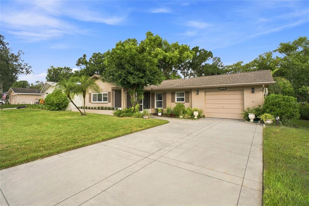Widened 2-car driveway and freshly landscaped~