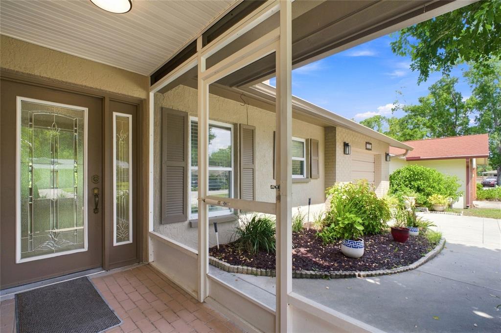 Welcoming front screened entry and new glass door~