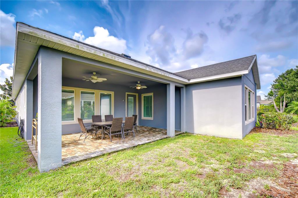 Peaceful outdoor living space perfect for morning coffee, relaxing afternoons, or entertaining guests.
