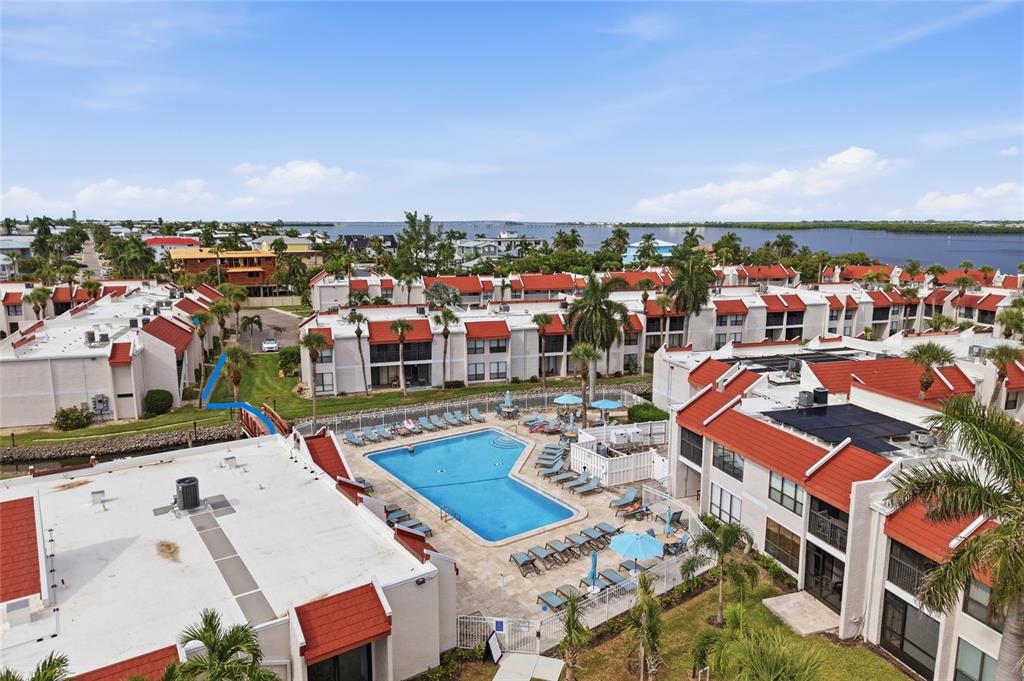 25 Steps from Condo to the Largest Heated Saltwater Pool on Anna Maria Island.