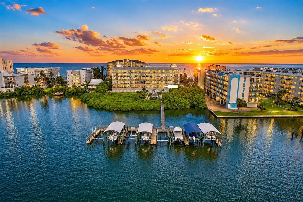 ... SUNSET AT INDIAN SHORES ... Small Private Boutique Complex of 30 Units ..Residence 202 Conveys with Assigned Garage Spot #1 plus ext spot 43 and Poolside Cabana # 10.. Plenty of Guest Parking..