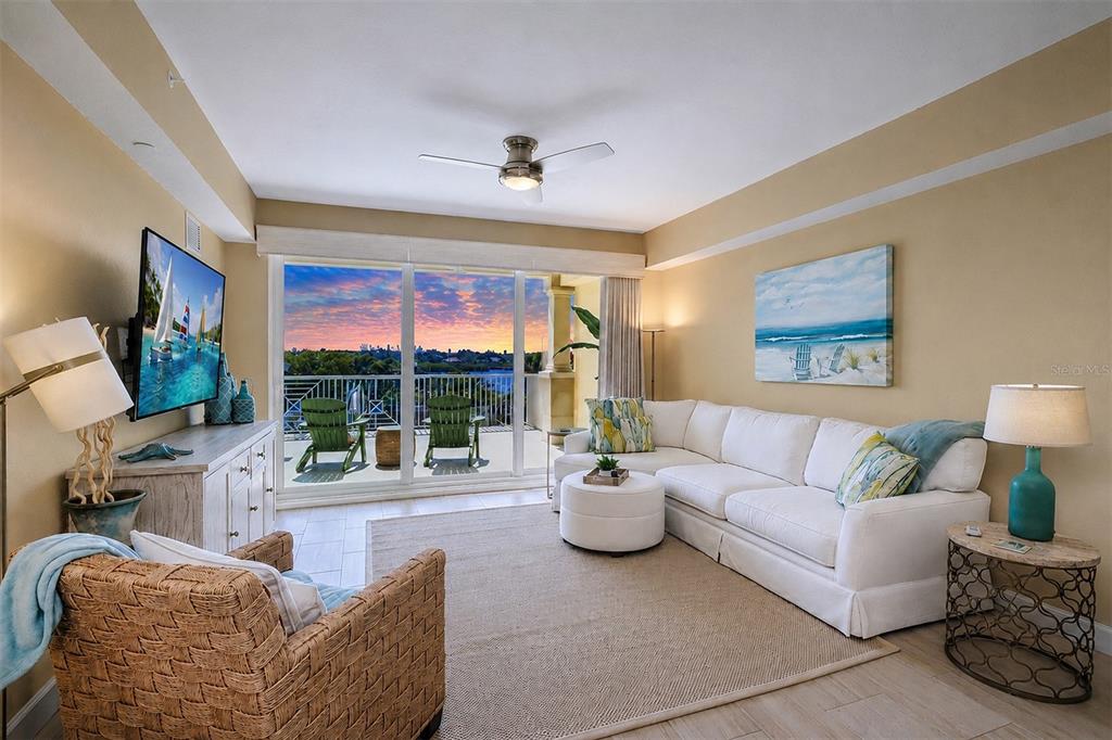 ... LIVING ROOM VIEW.. Beautiful twilight Sunset Skies at the Dolphin Key.. Residence 202 enjoys a rare 30' x 20' Extended Balcony... 3 Bedroom 2 Bath with 1560 Sq Feet..