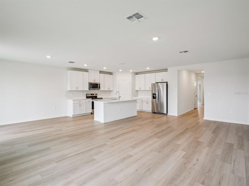 Interior photos are not of the actual home but are photos of the builder home with the same floorplan with similar interior finishes and features.