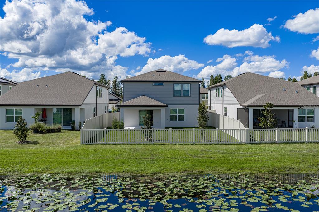 Fully Fenced Conservation Pond Lot with Covered Lanai