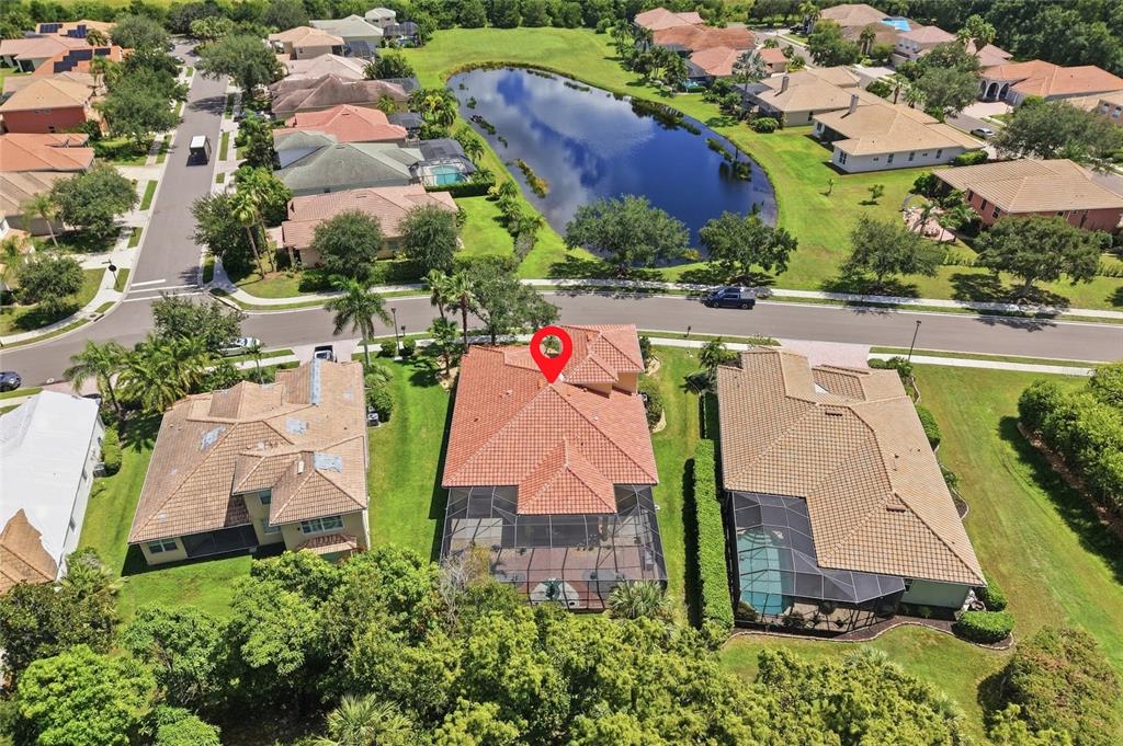 The home offers a private backyard and beautiful views of the lake in the front. Brand new tile roof (2025).