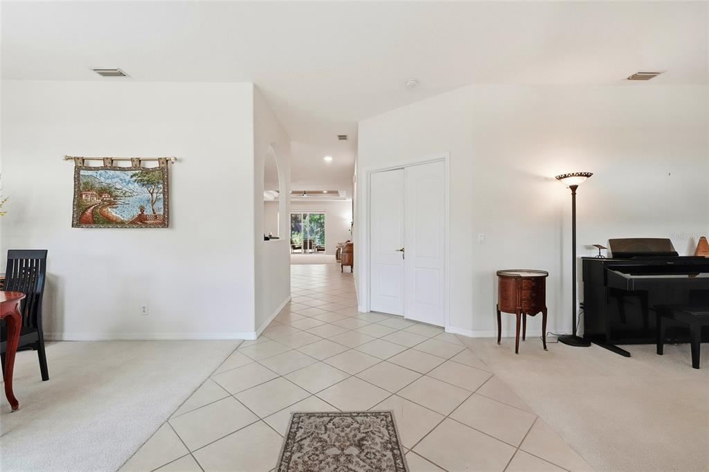 Front Entrance with Dining area to the left and formal sitting area to the right.
