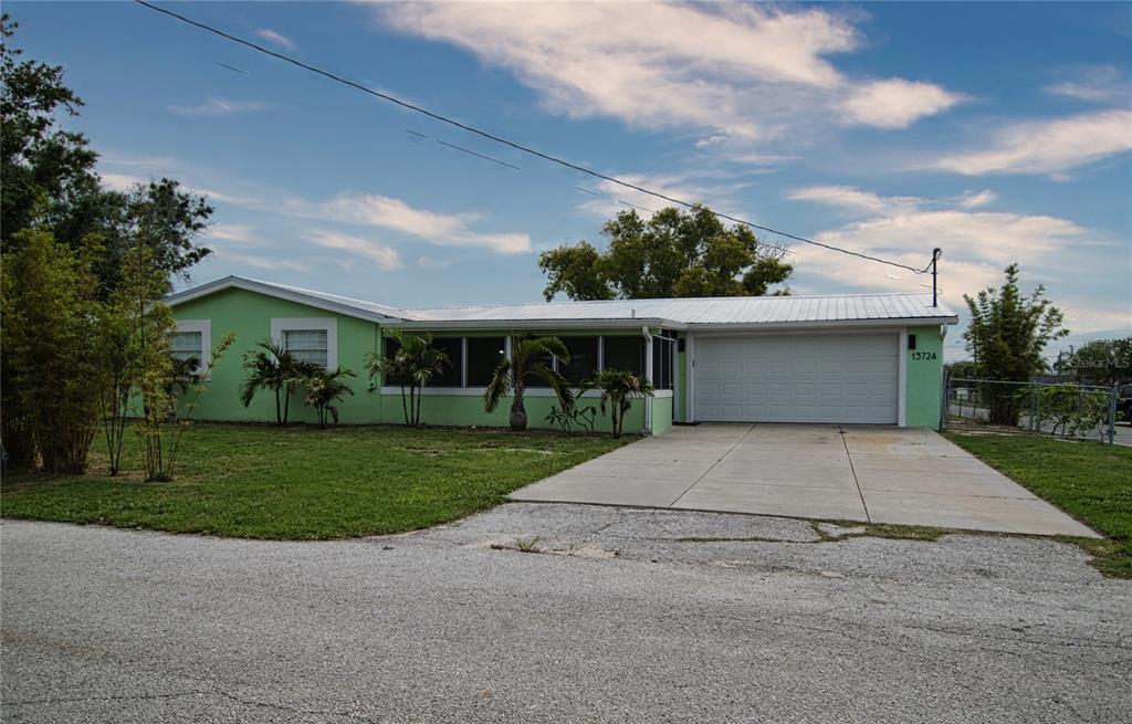 Wonderful coastal home with .23 acres of land, fully fenced.