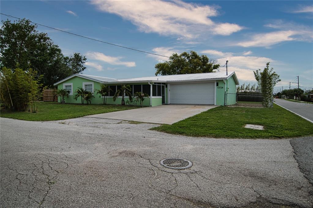 Amazing corner lot and large parking pad.