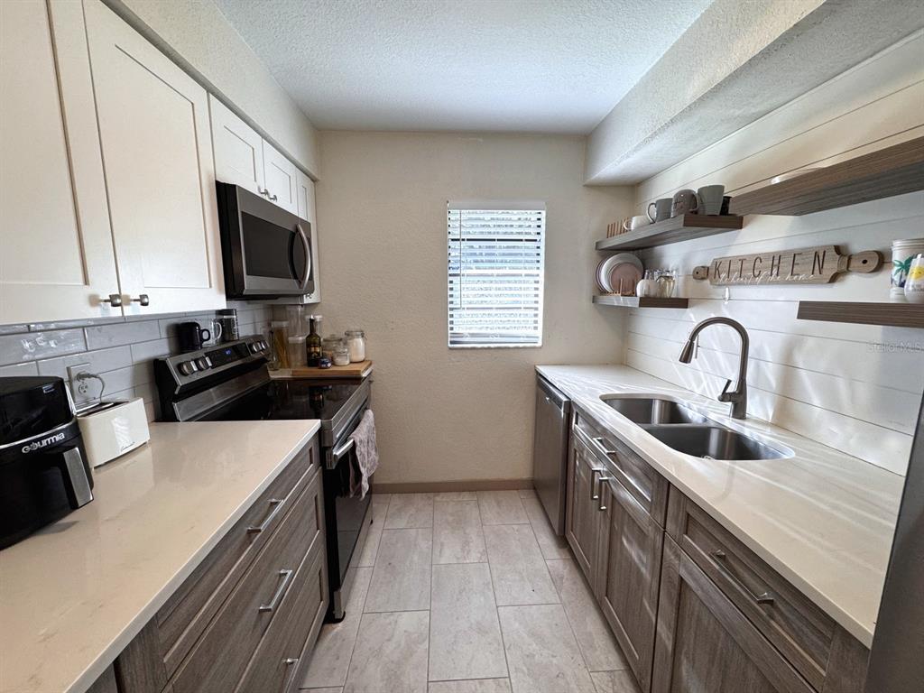 Property for sale at 3414 NW 21ST DRIVE UNIT E4, GAINESVILLE, FL, 32605