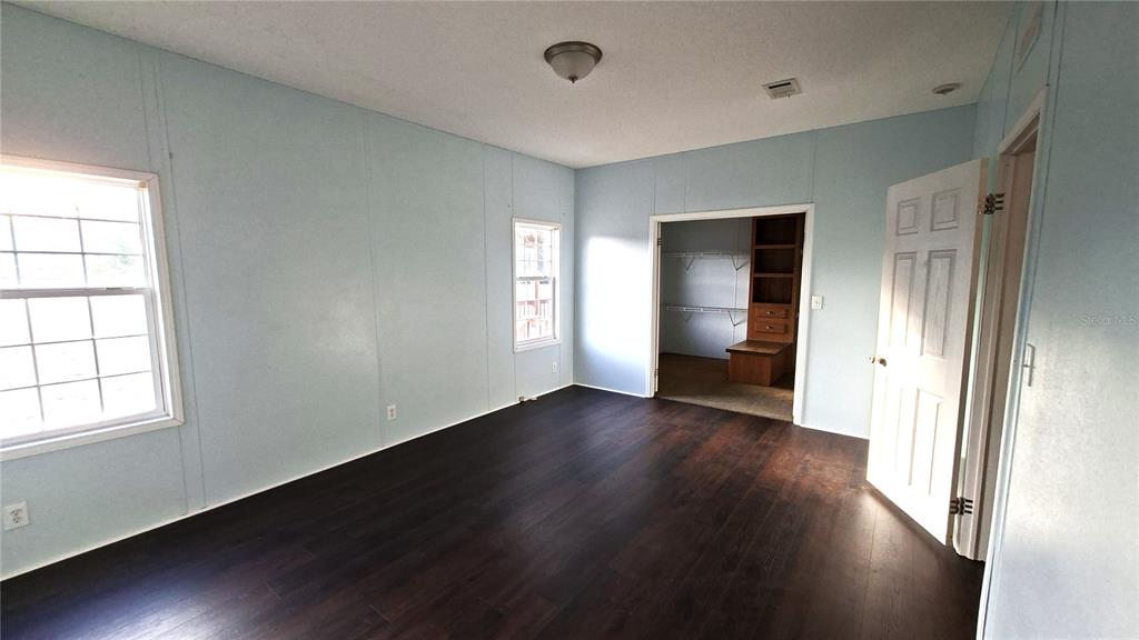 primary bedroom looking towards walk in closet