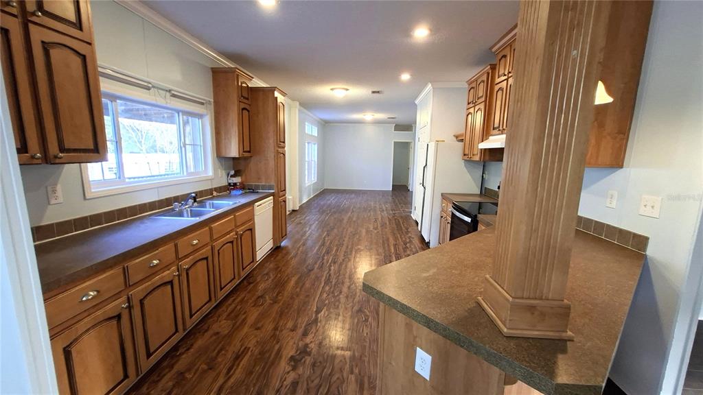kitchen/breakfast bar looking back toward living roon