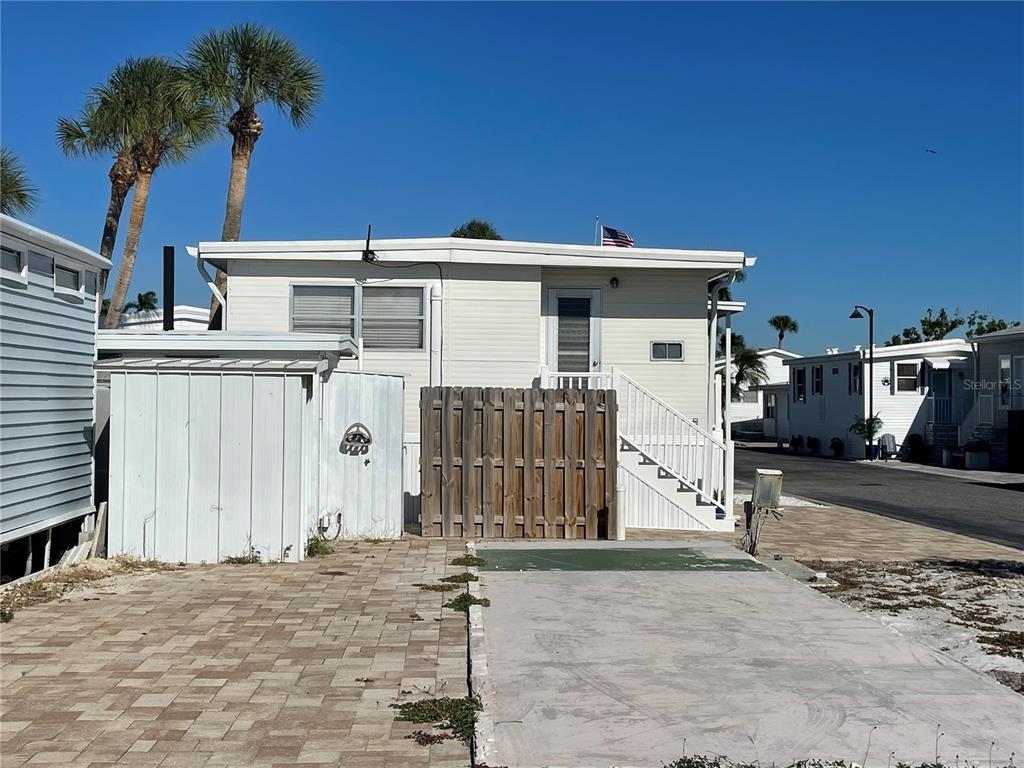 Lot D-11 with Storage Shed in the background and the paved driveway