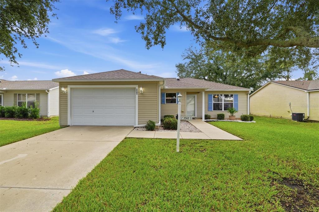 Front exterior:3565 Idlewood Loop exterior – Corpus Christi model home in Village of Summerhill, The Villages FL 32162