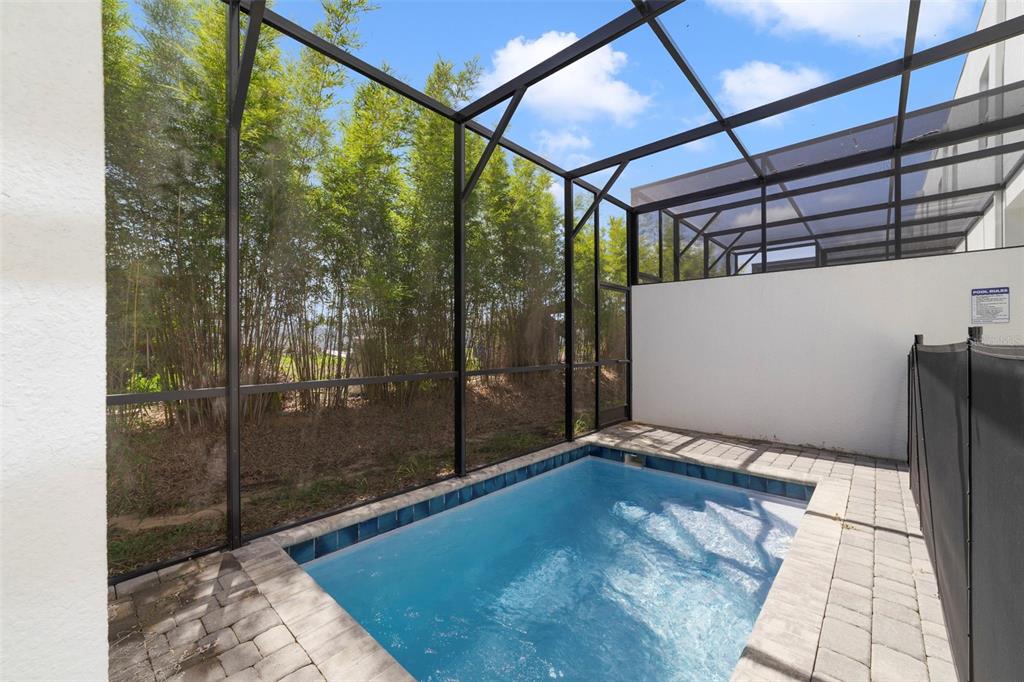 Private screened pool right outside your back door.