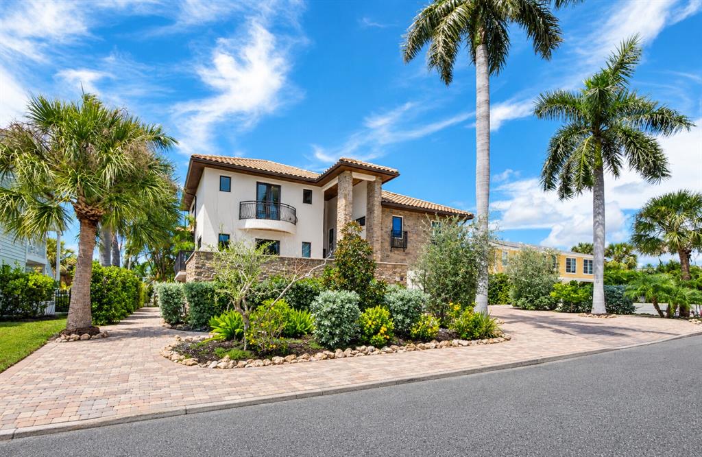 Welcome to 795 Marbury Lane, a gorgeous waterfront Mediterranean retreat
