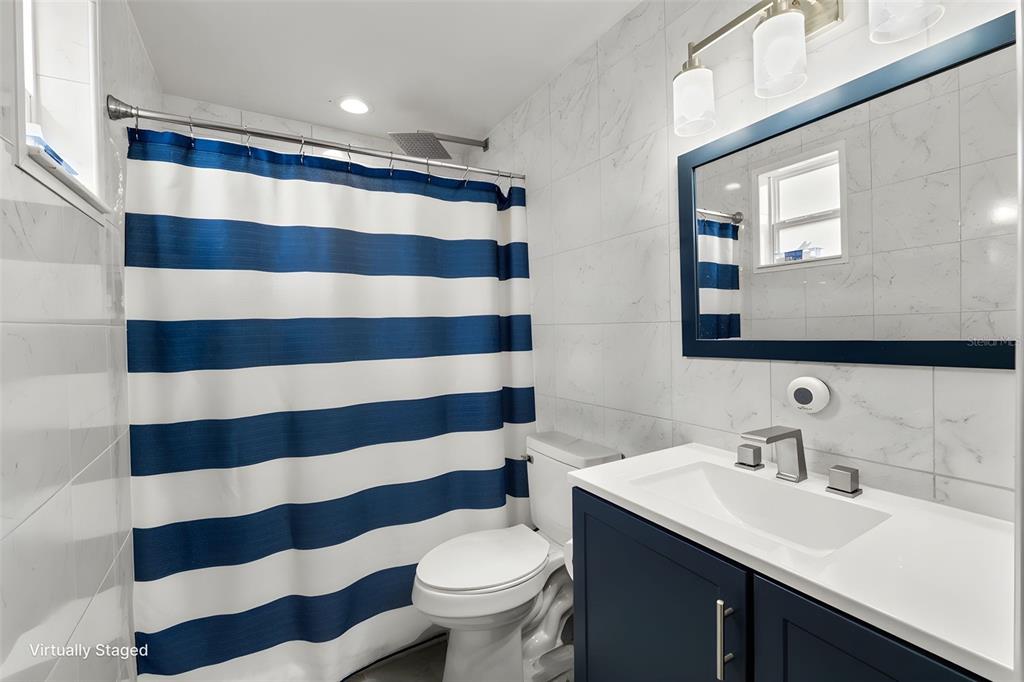 PRIMARY BATHROOM - STAND UP SHOWER - FLOOR TO CEILING TILE