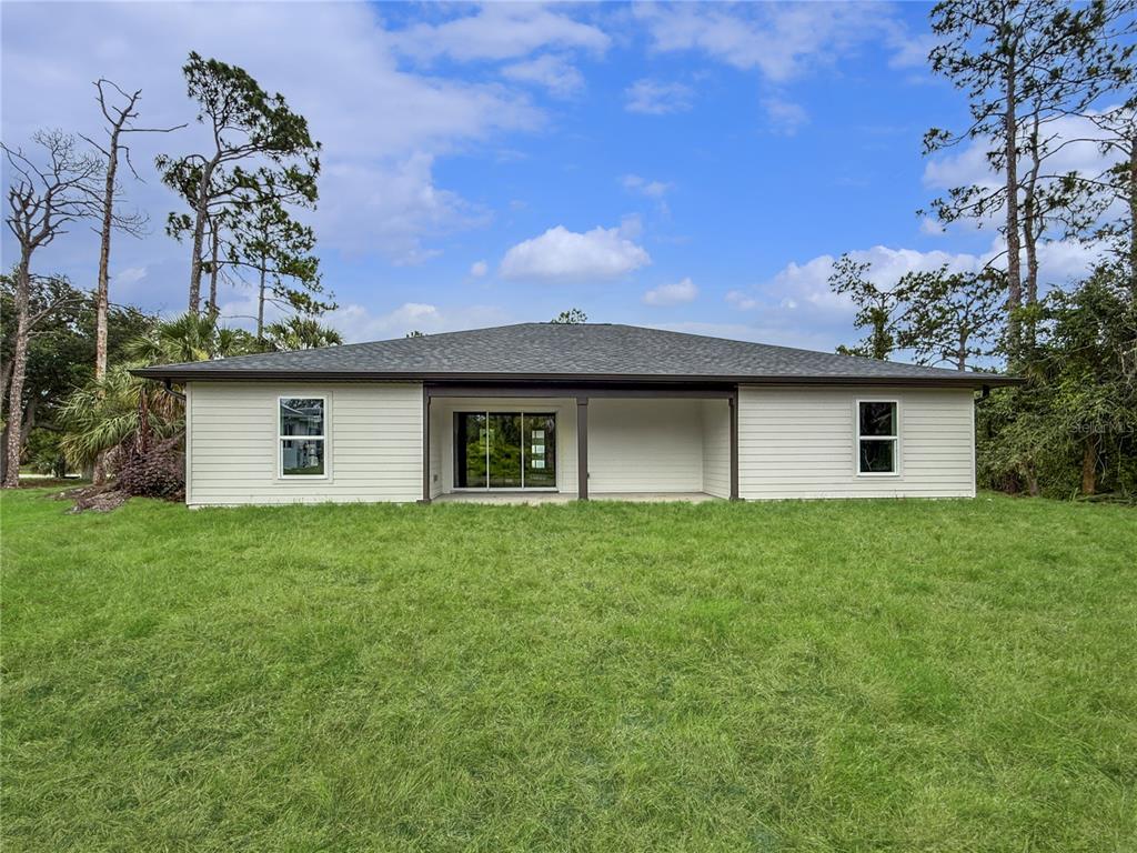 Rear Elevation featuring Covered Lanai