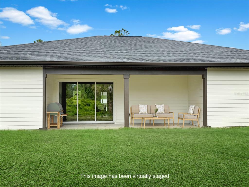 Rear Elevation featuring Covered Lanai