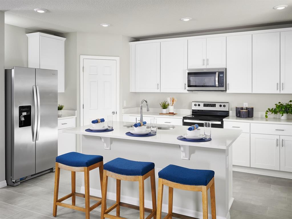 Photo is not of the actual home, but is an inspirational photo of builder’s model home and may depict options, furnishings, and/or decorator features that are not included.