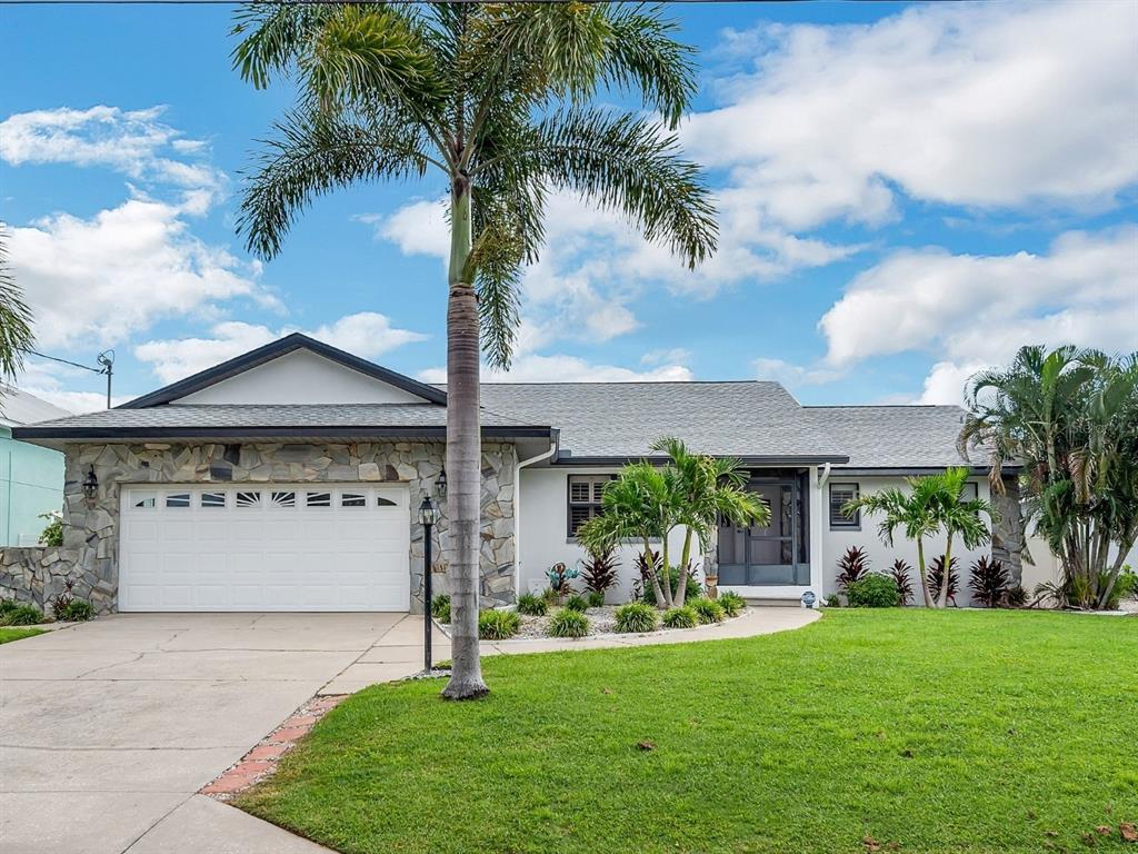 4 bed, 2 bath, heated pool, 2 boat lifts with Deep-Water Apollo Beach Canal Living with Direct Tampa Bay Access.