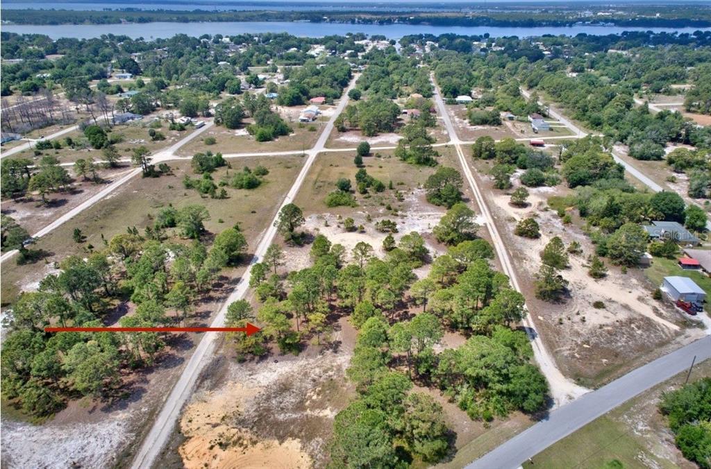 Arrow is approx location. Buyer recommended to have survey done for exact boundary lines